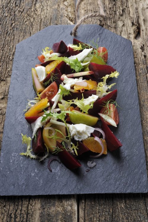 Food Styling & Photography: Salad on a chalkboard... | Vegan mozzarella, greens, apples, red beet, tomatoes & citrus salad | Recipe & styling Orsola Ciriello Kogan | ©LuciaZeccara